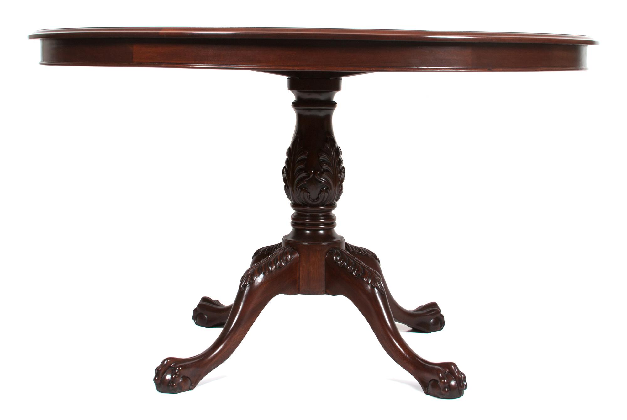 A Victorian Style Mahogany Circular Dining Table Height 31 x diameter 53 inches. — 20TH CENTURY