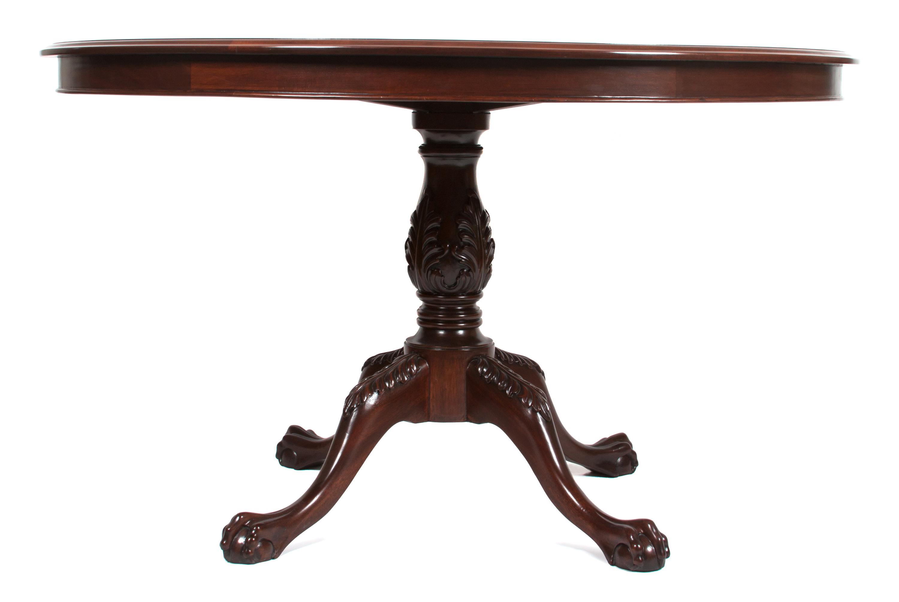 A Victorian Style Mahogany Circular Dining Table Height 31 x diameter 53 inches. — 20TH CENTURY