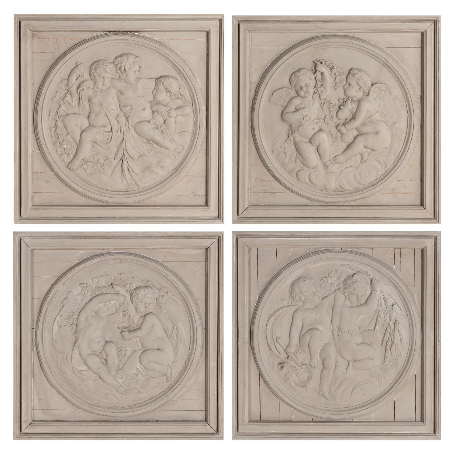 A Set of Four Neoclassical Style Gray-Painted Wood Roundels