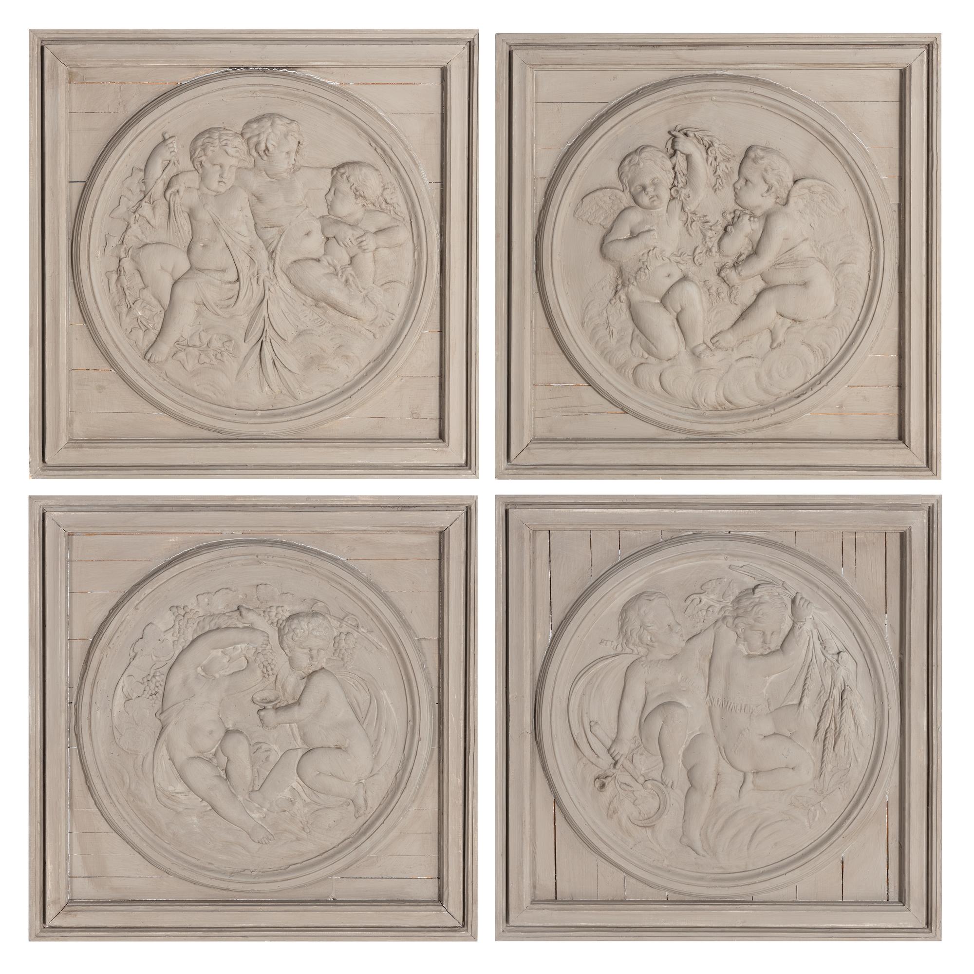 A Set of Four Neoclassical Style Gray-Painted Wood Roundels