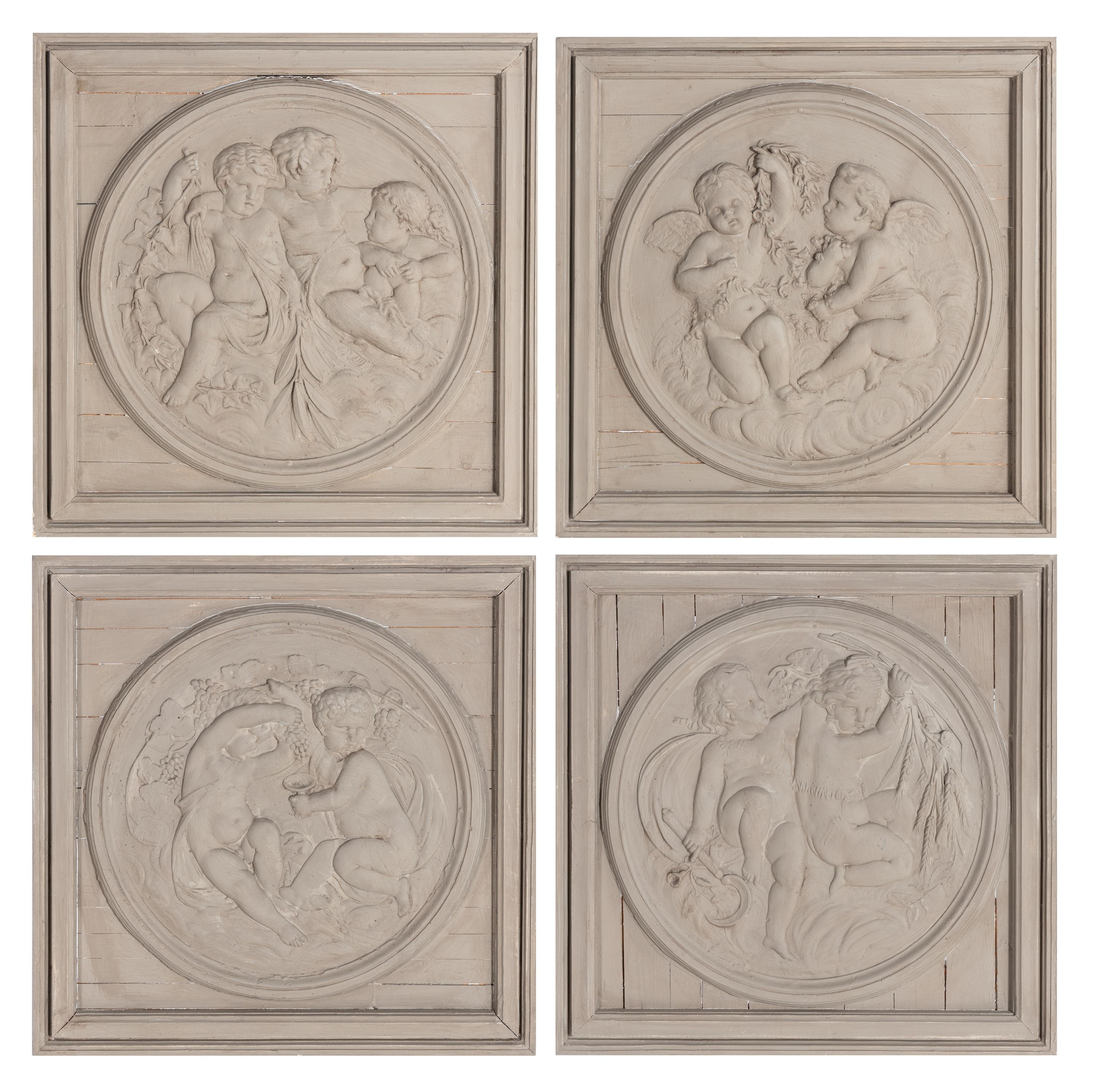 A Set of Four Neoclassical Style Gray-Painted Wood Roundels