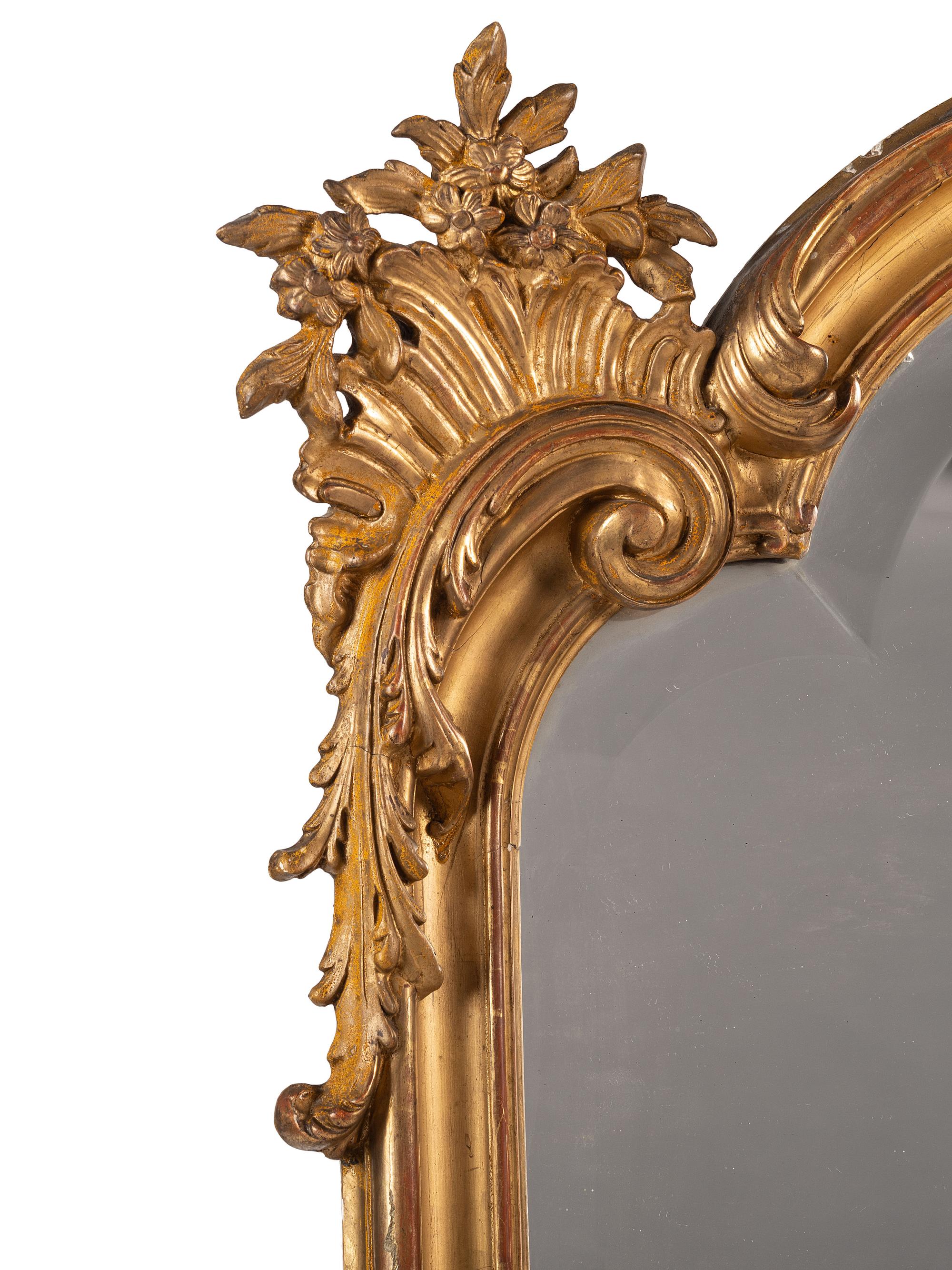 A Pair of Rococo Style Giltwood Mirrors