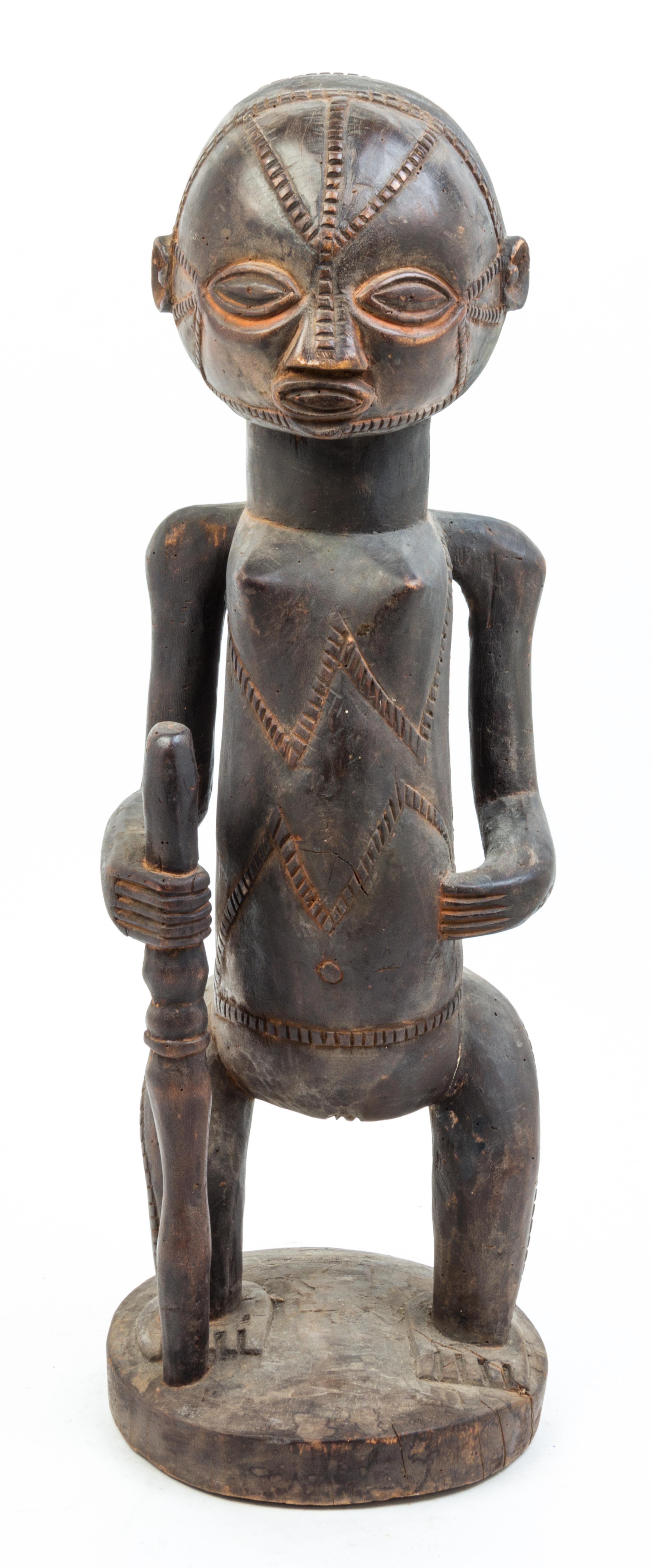 A Group of Three Wood Figures Height of tallest 30 1/2 inches.