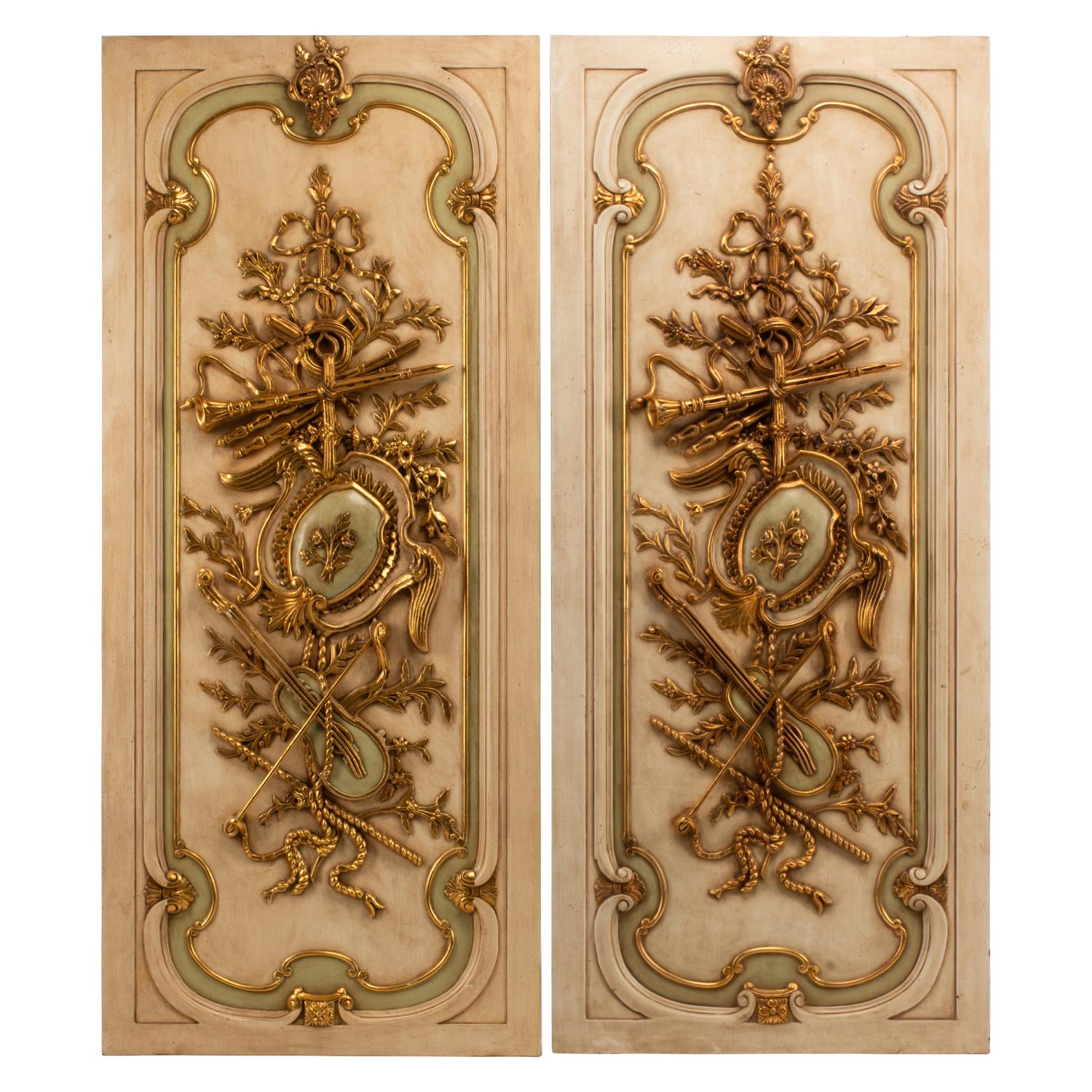 A Set of Four French Neoclassical Style Painted and Parcel Gilt Panels