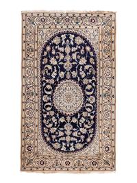 A Persian Nain Wool Rug