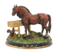A Cast Iron Doorstop Height 9 1/2 inches.