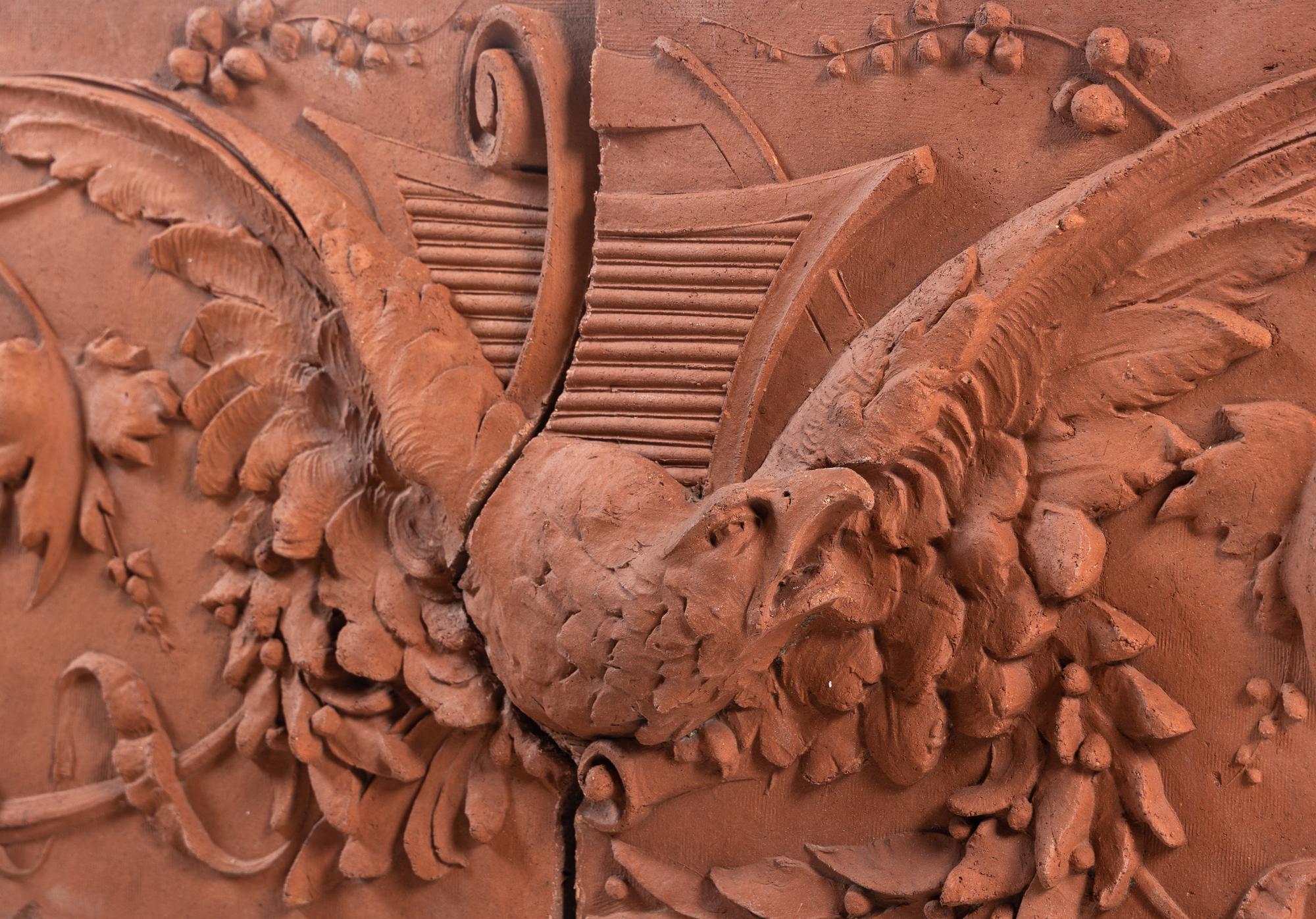 A Terracotta Two-Part Architectural Frieze Panel