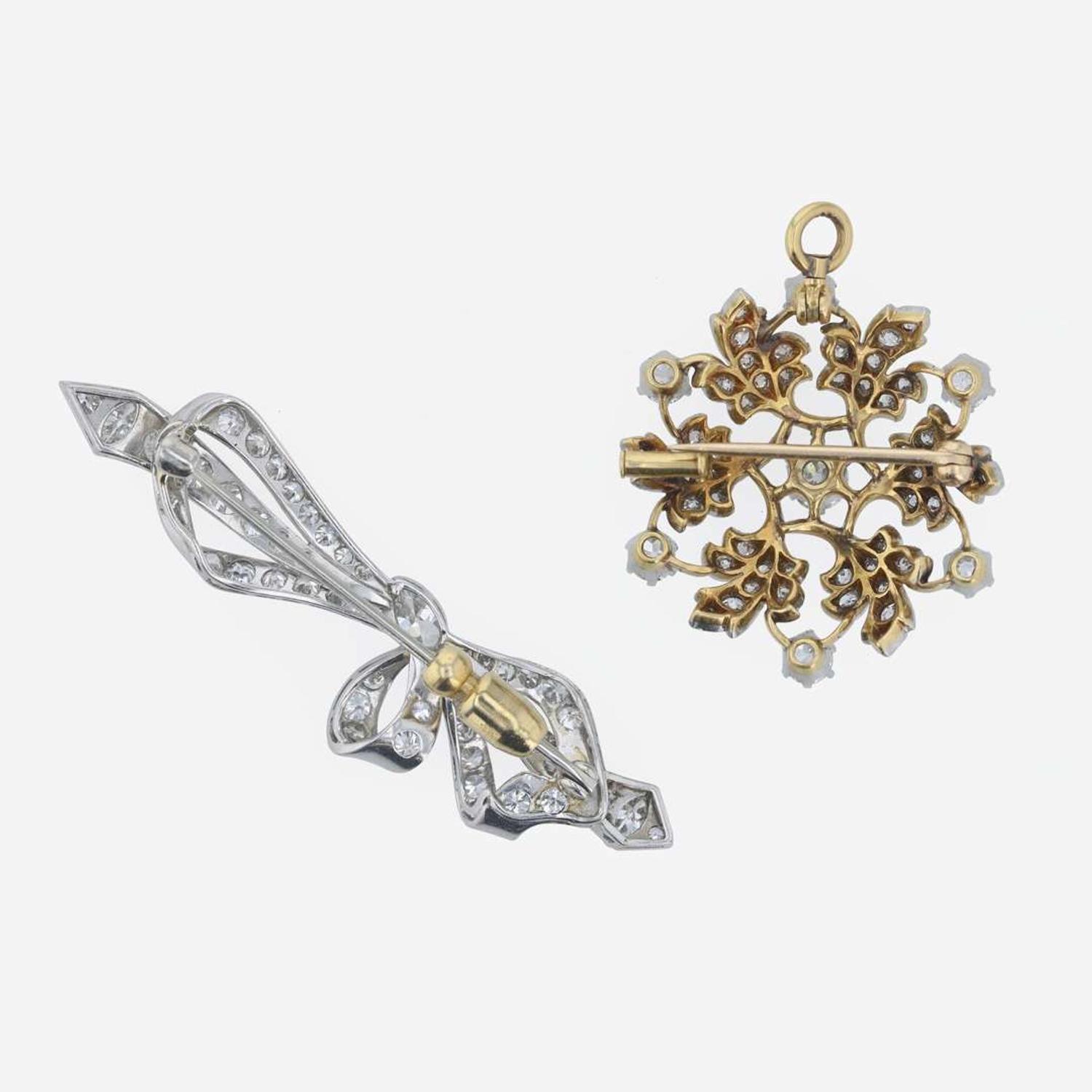 Two 18K gold and diamond brooches