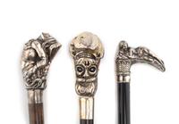 A Group of Three Silver Mounted Figural Walking Sticks