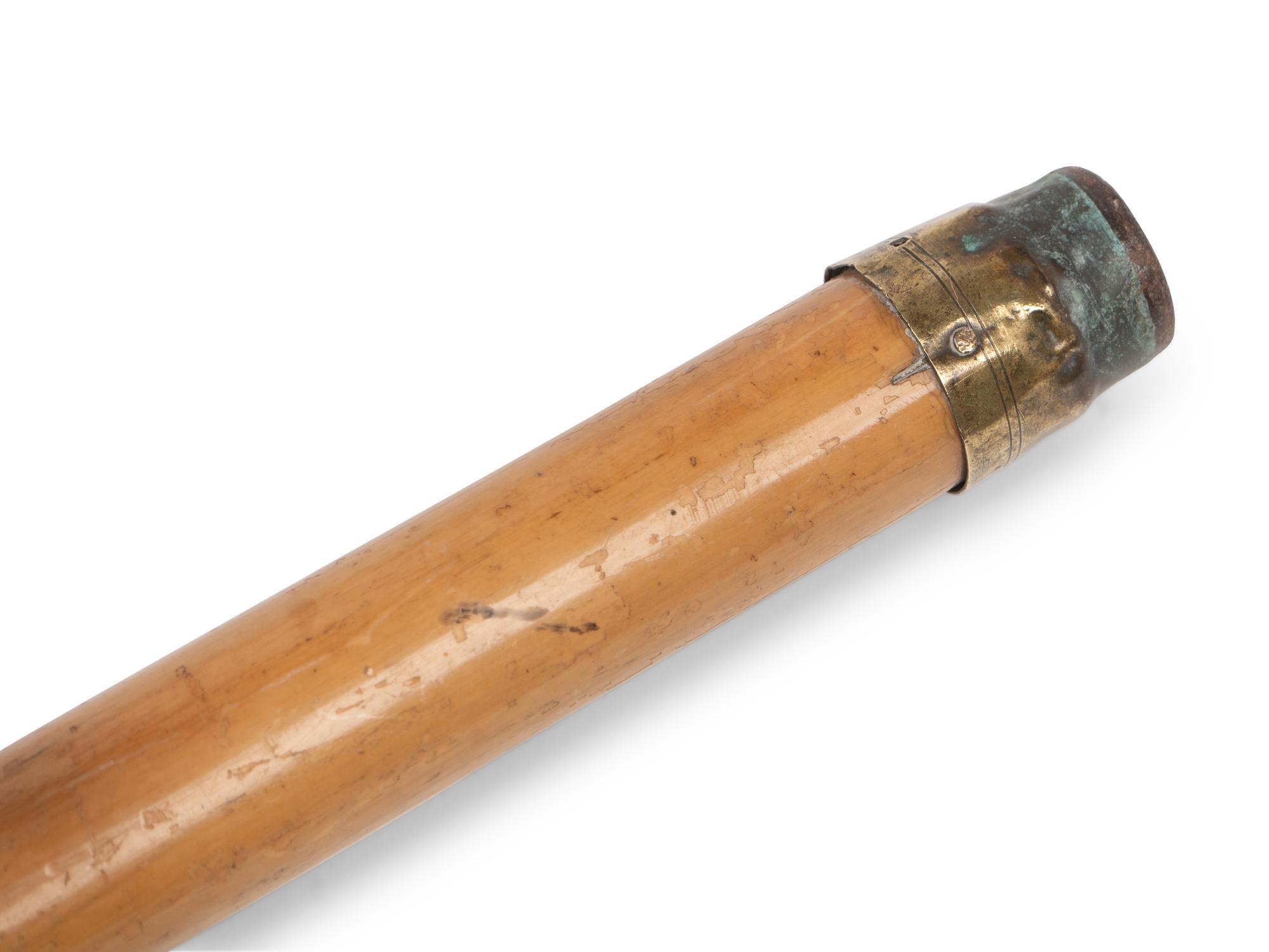 Two Metal Mounted Walking Sticks