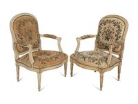A Pair of Louis XVI Cream Painted Fauteuils