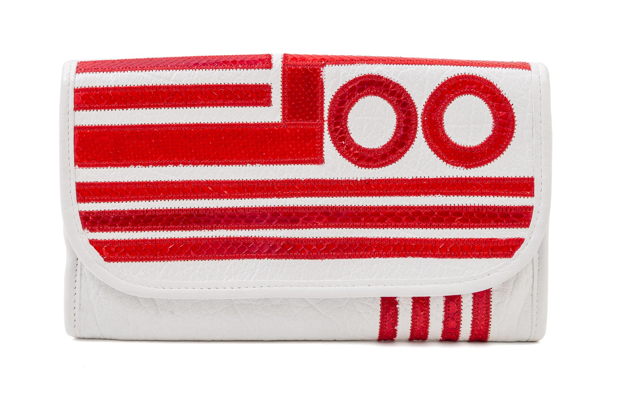 A Carlos Falchi White Leather Optical Clutch, 9" x 5.5" x .5".