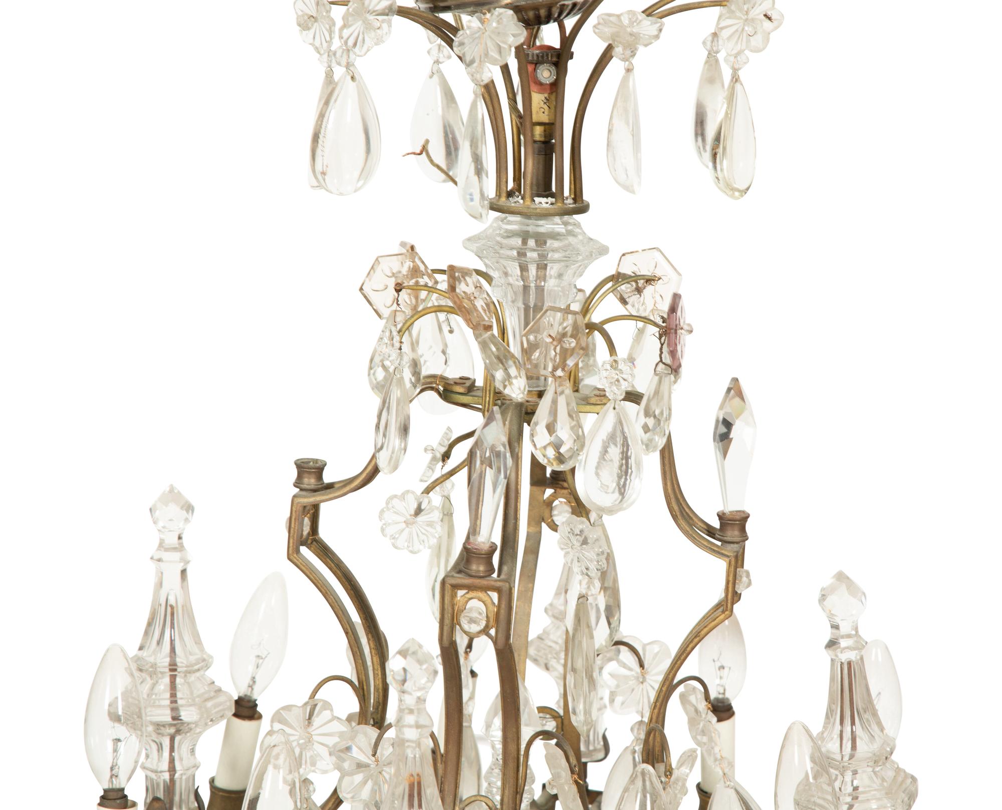 A Louis XV Style Gilt Bronze and Cut Glass Eight-Light Chandelier