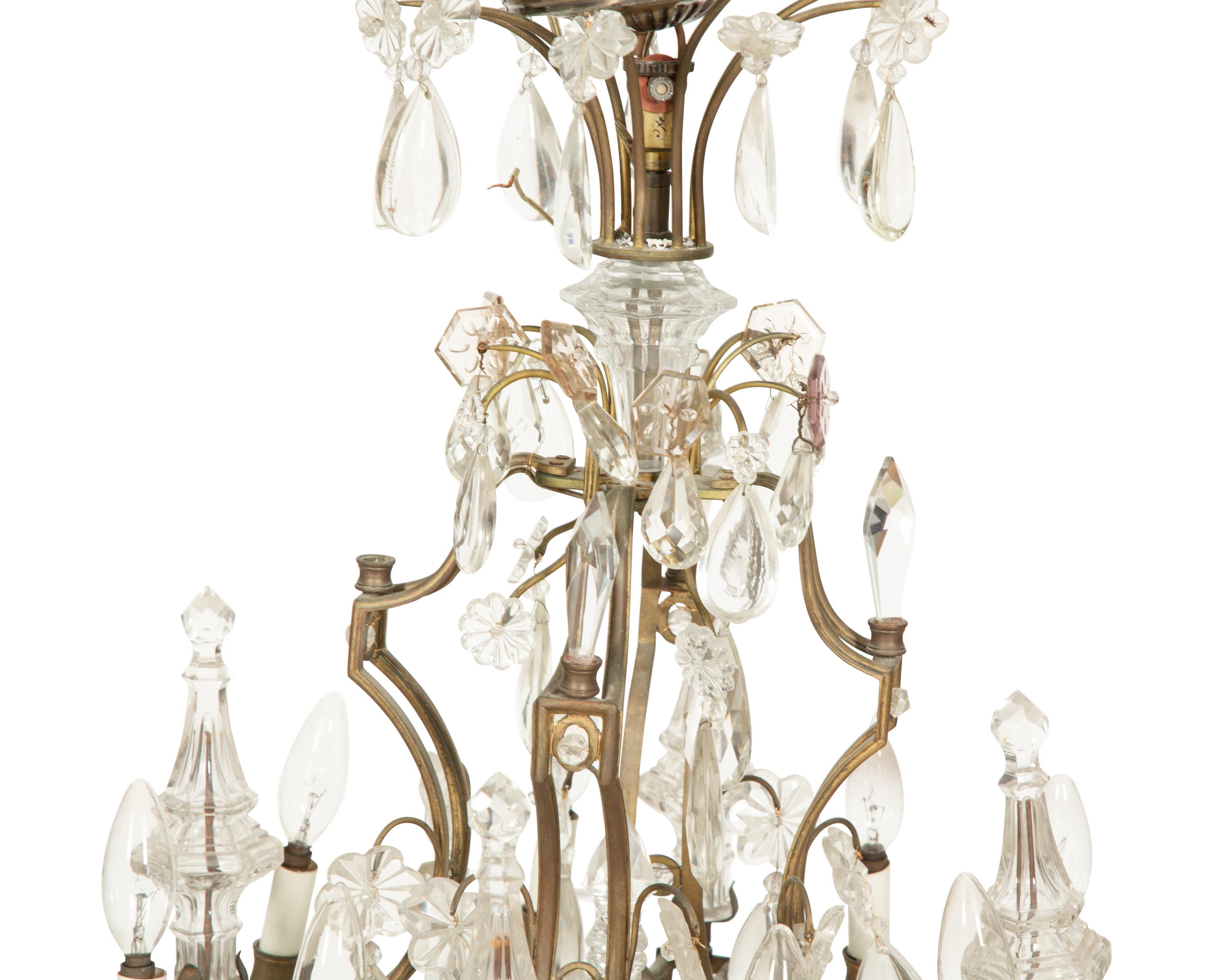 A Louis XV Style Gilt Bronze and Cut Glass Eight-Light Chandelier