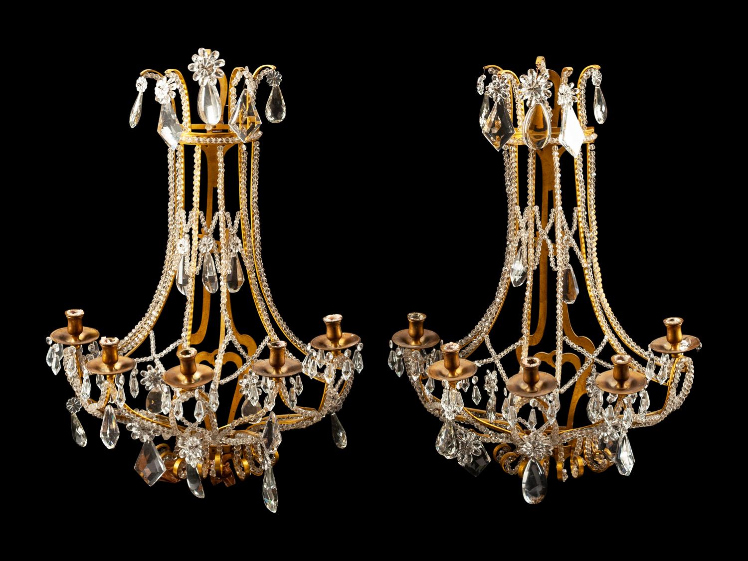 A Pair of French Gilt Bronze and Cut Glass Five-Light Sconces