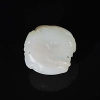 A Chinese white jade figural group depicting mandarin ducks 白玉雕双凫衔荷花 Qing Dynasty ?