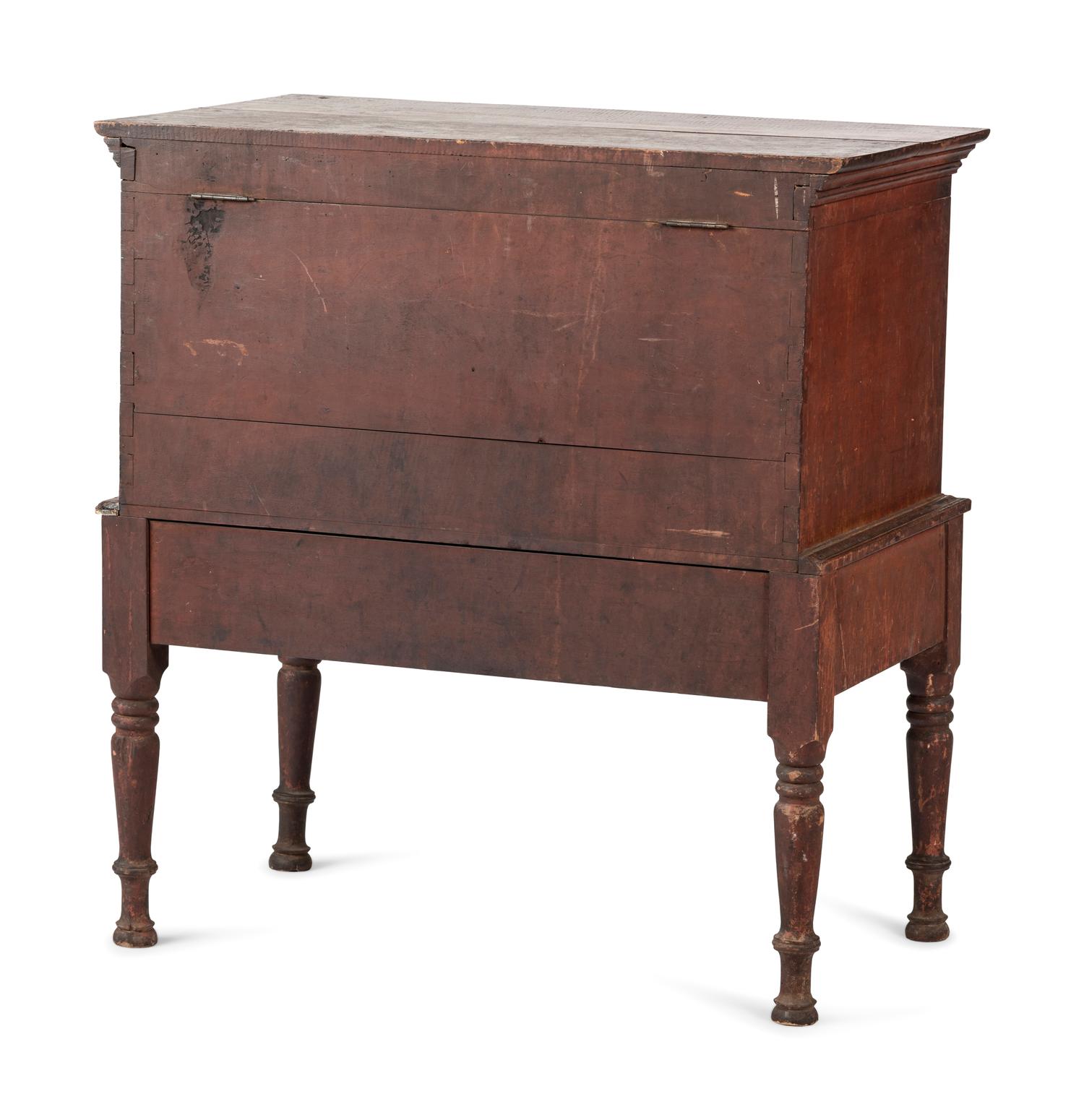 A Late Federal Red-Stained and Figured Mixed Woods Chest on Stand
