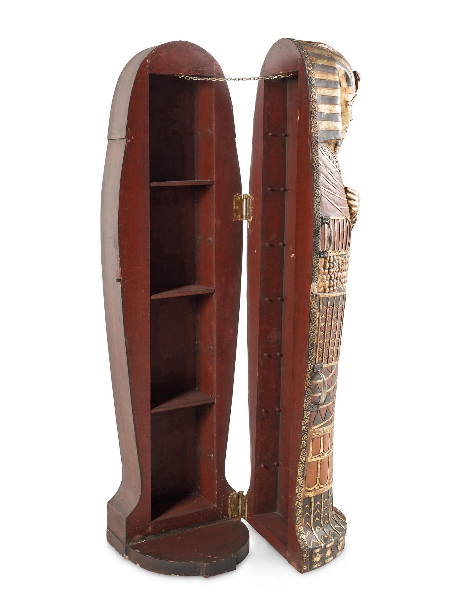 A Continental Carved and Painted Wood Sarcophagus-Form Bar Cabinet