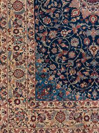 A Signed Isfahan Silk Rug