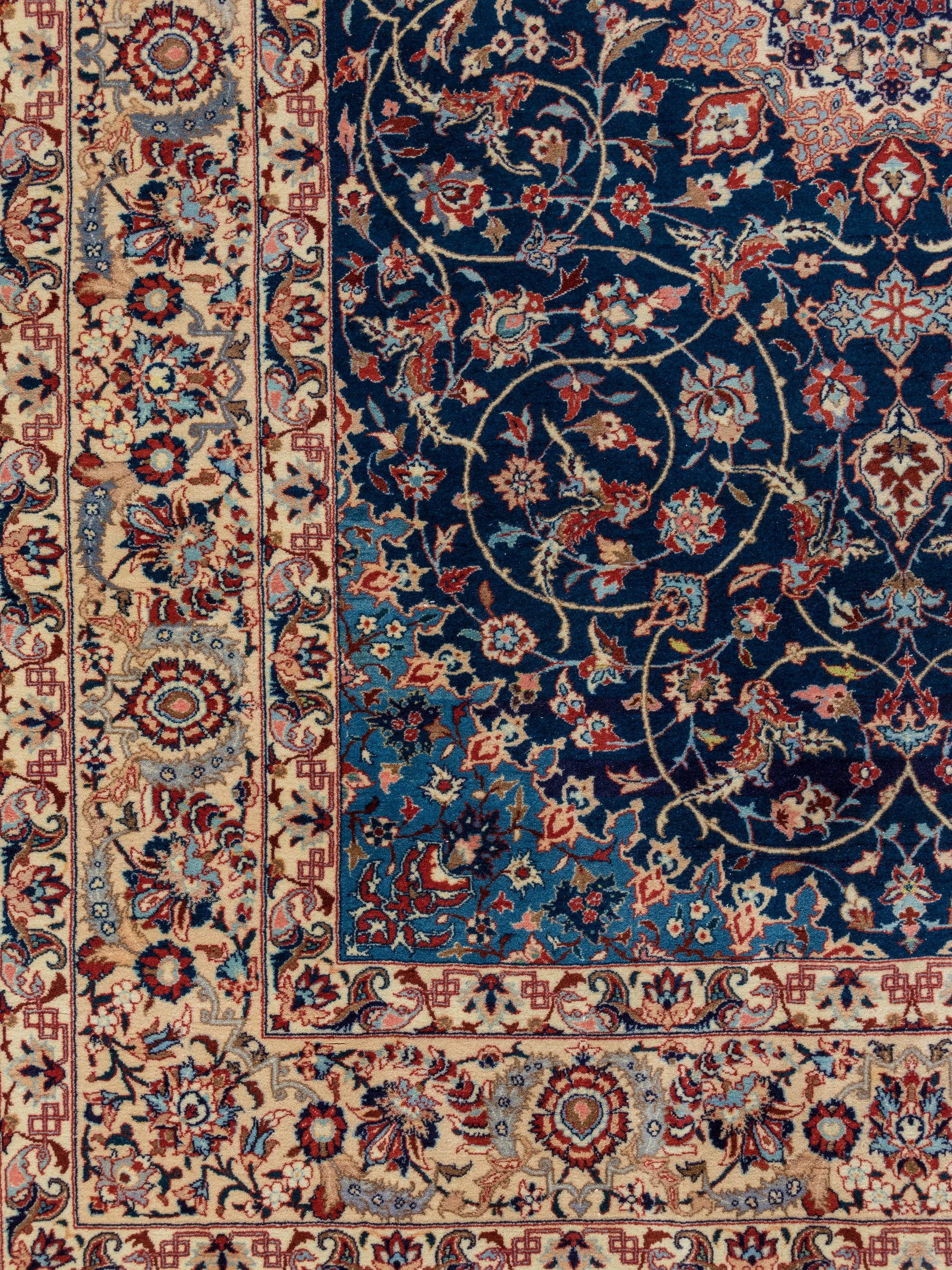 A Signed Isfahan Silk Rug