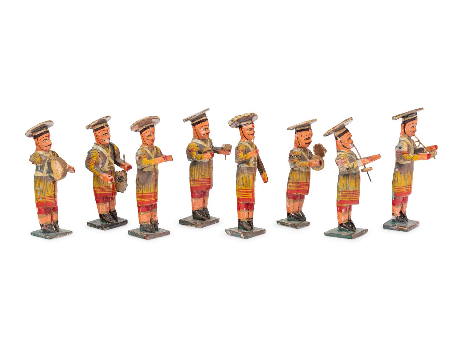 Eight Russian Polychromed Carved Wood Marchind Band Figures