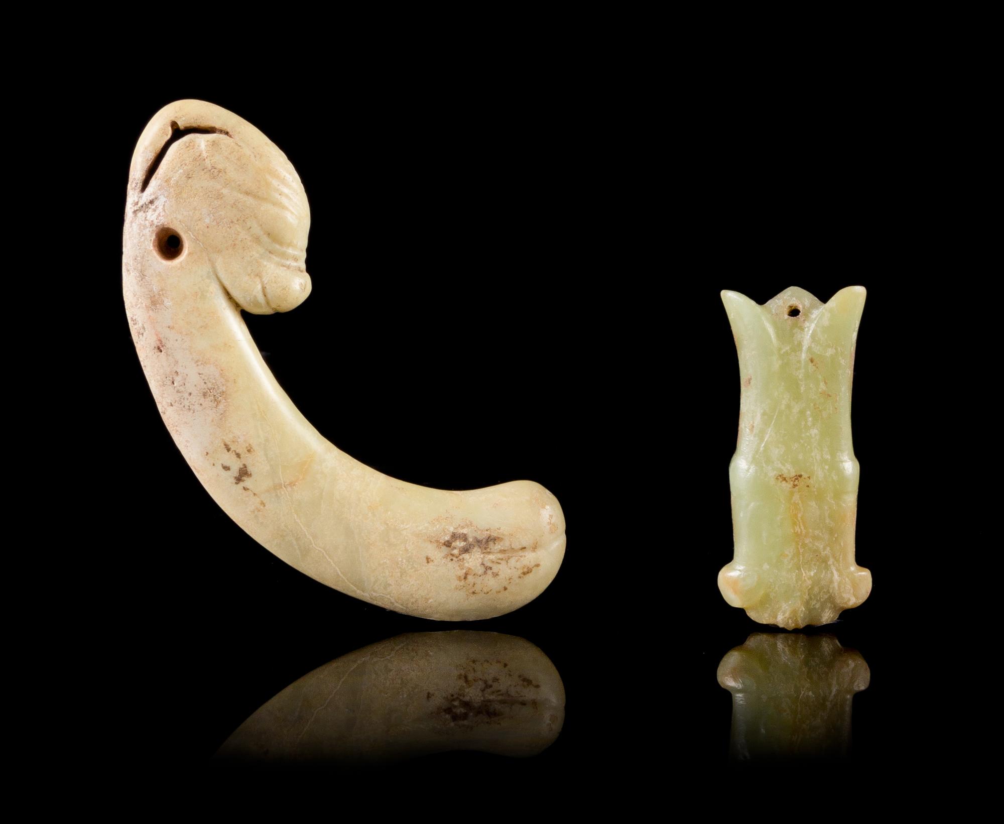 Two Jade Pendants Length of largest 3 3/4 inches.