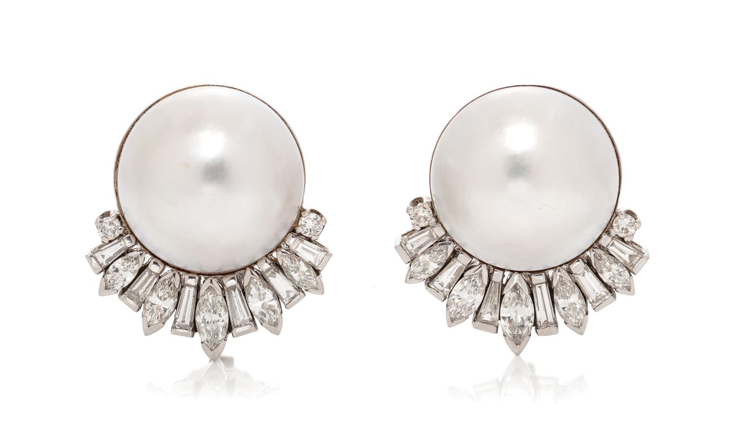 A Pair of Platinum, Cultured Mabe Pearl and Diamond Earclips, 16.65 dwts.