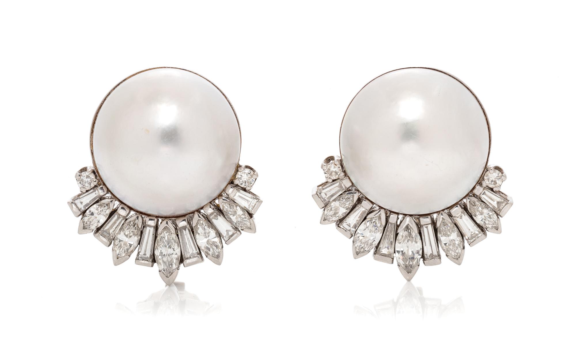 A Pair of Platinum, Cultured Mabe Pearl and Diamond Earclips, 16.65 dwts.