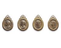 A group of four Italian bronze bas relief plaques depicting Claudius, A Roman Emperor, Domitia, and Flavia Domitilla, late 16th century