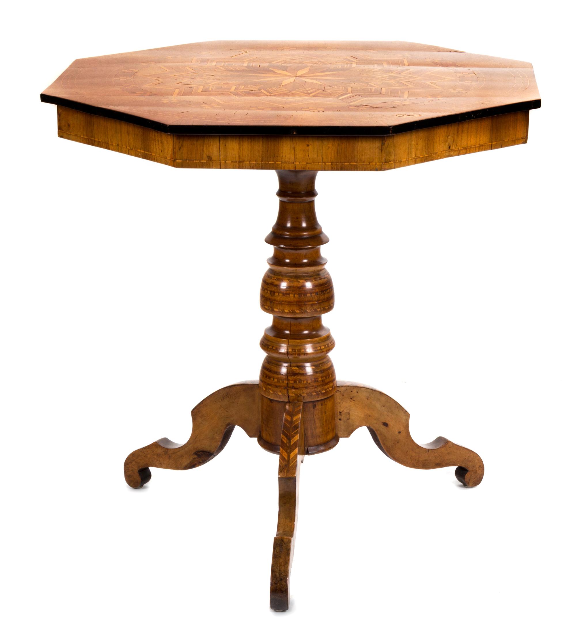 An Italian Walnut and Marquetry Center Table Height 28 1/2 x diameter 29 inches. — 19TH CENTURY