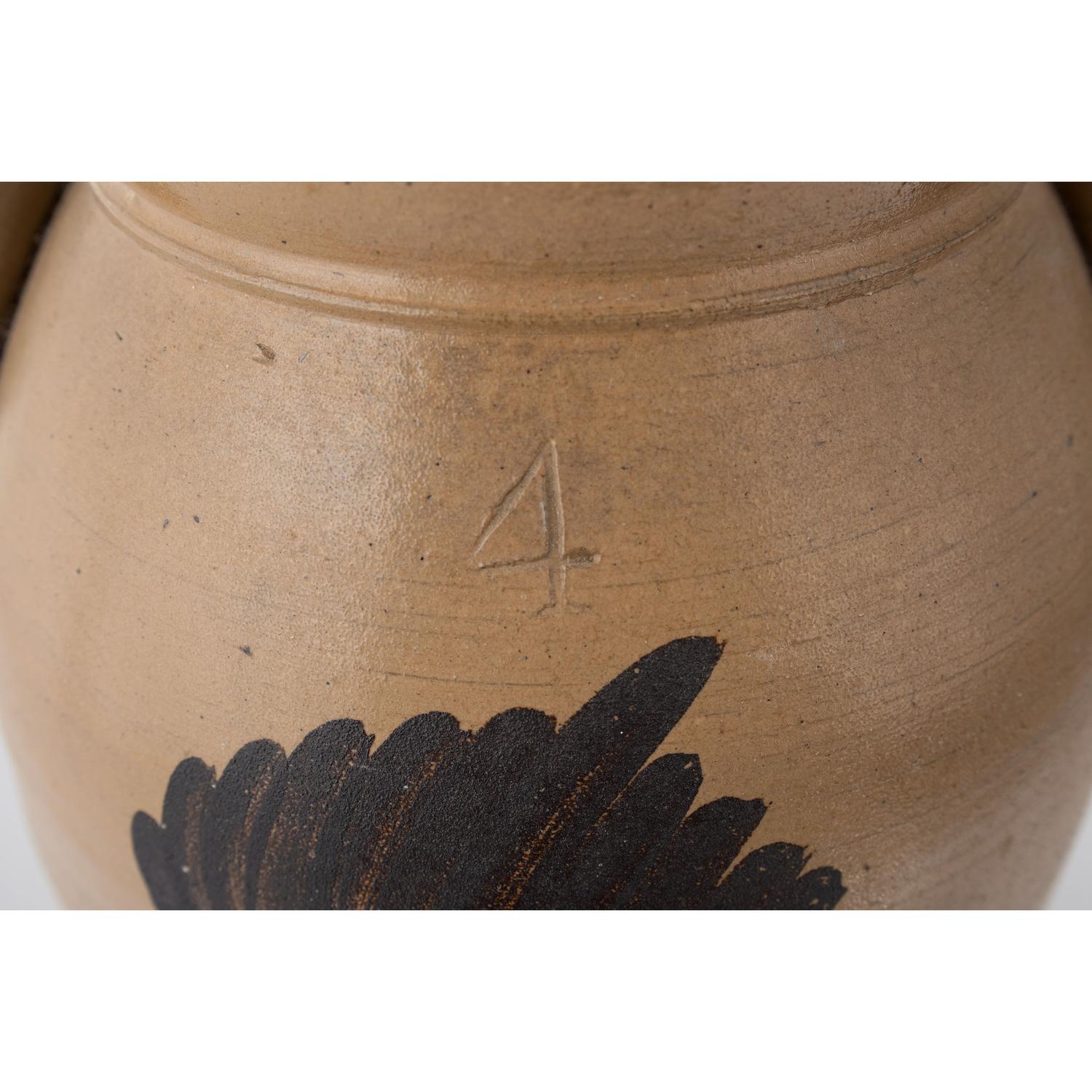 A Four Gallon Stoneware Butter Churn