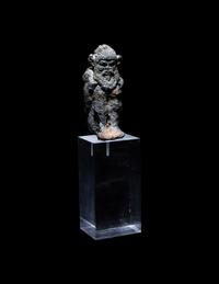 A Greek Bronze Satyr