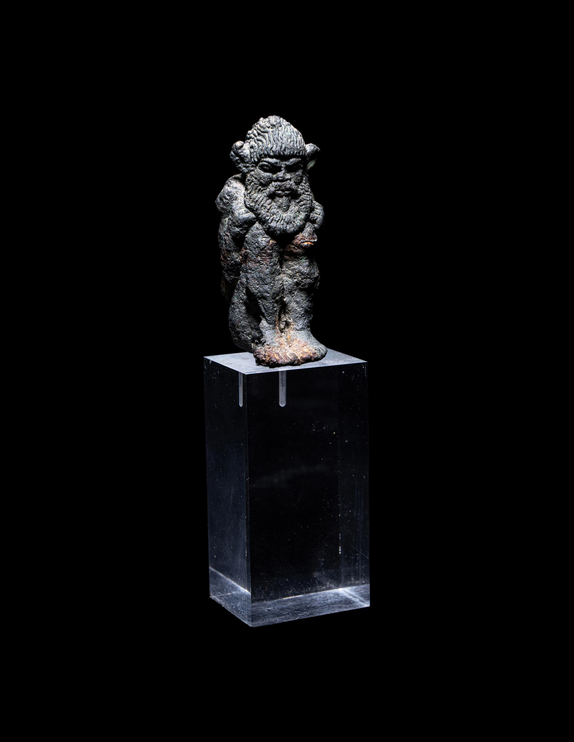 A Greek Bronze Satyr