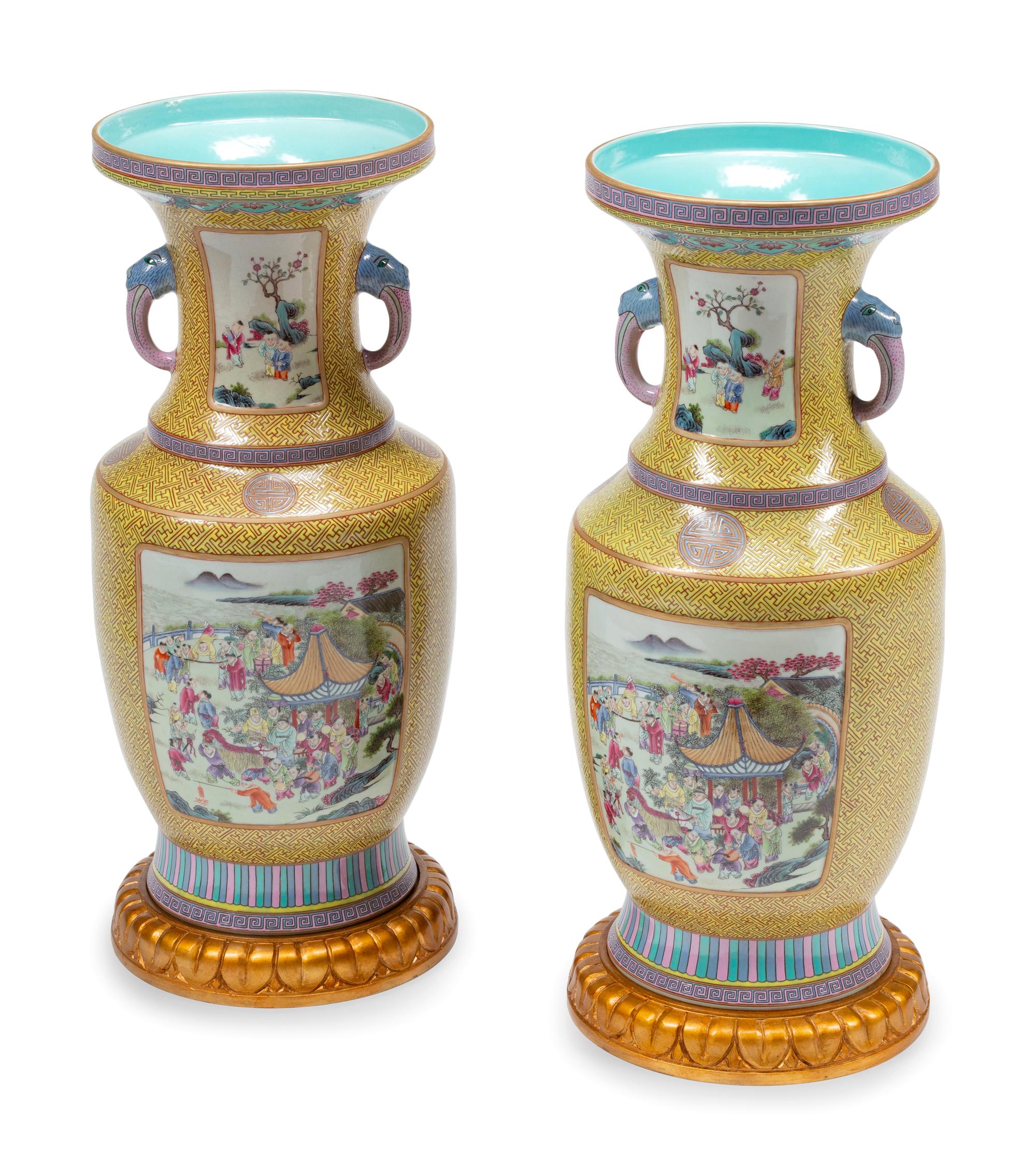 A Pair of Chinese Export Enameled Porcelain Vases with Giltwood Bases