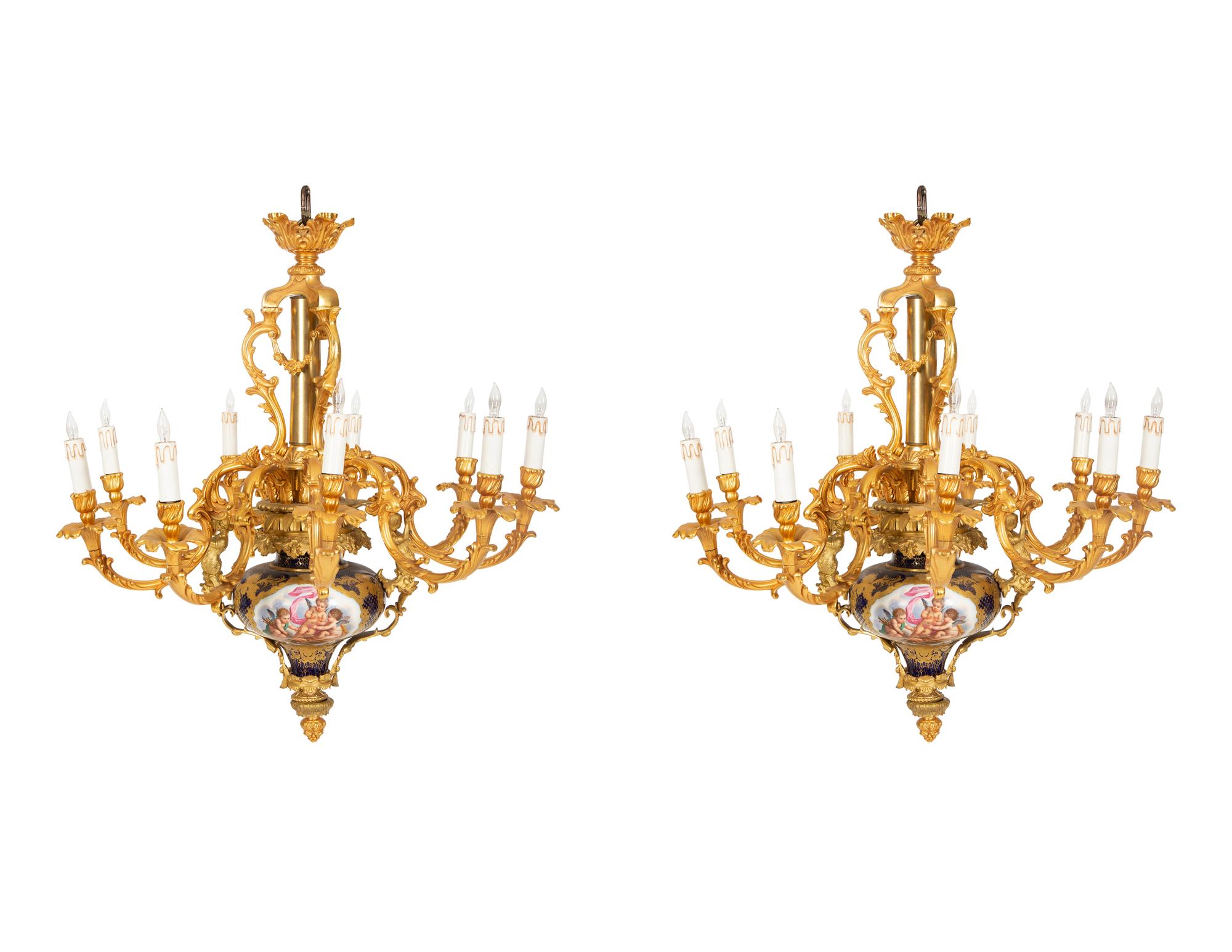 A Pair of Sèvres Style Porcelain and Gilt Bronze Nine-Light Chandeliers
