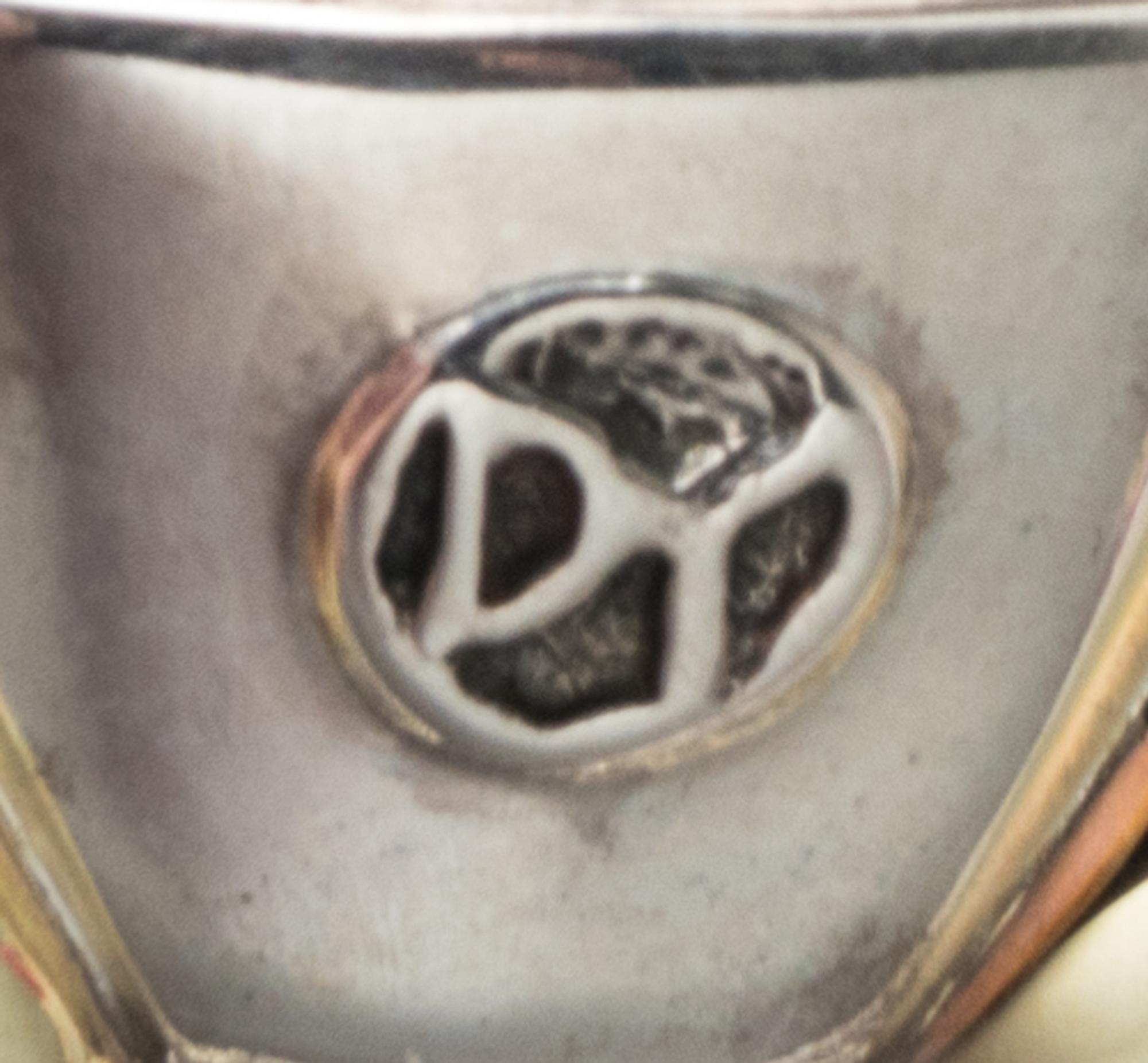 A Sterling Silver, 14 Karat Yellow Gold and Garnet 'Noblesse' Cuff Bracelet, David Yurman, 36.70 dwts.