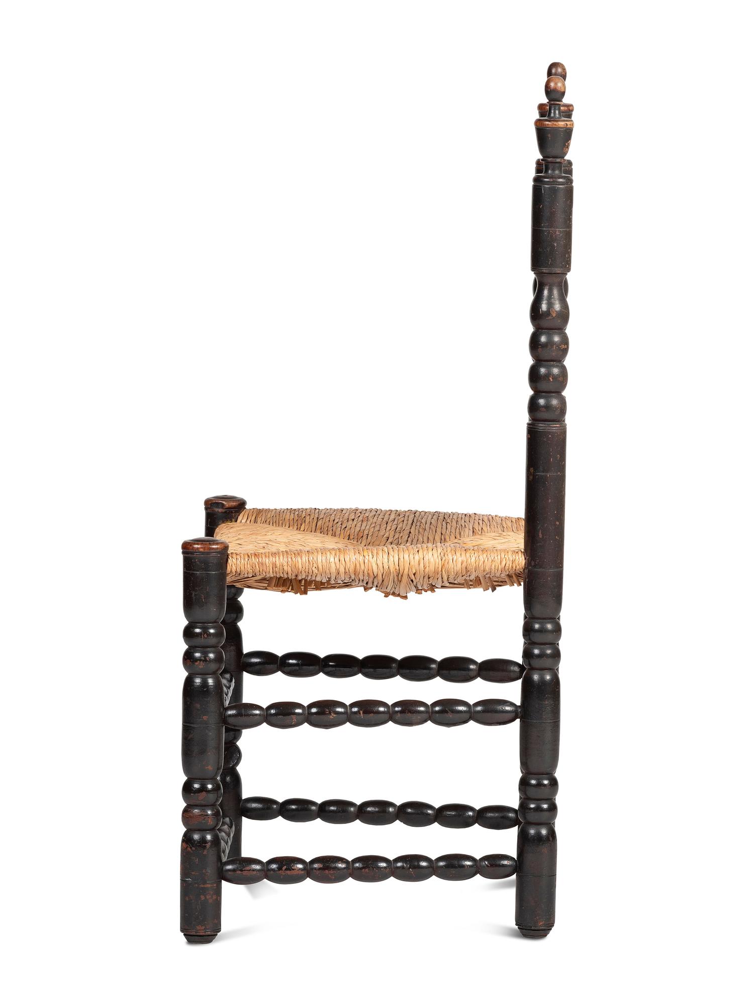 A Rare Pilgrim Century Black Painted Sausage-Turned Rush-Seat Side Chair