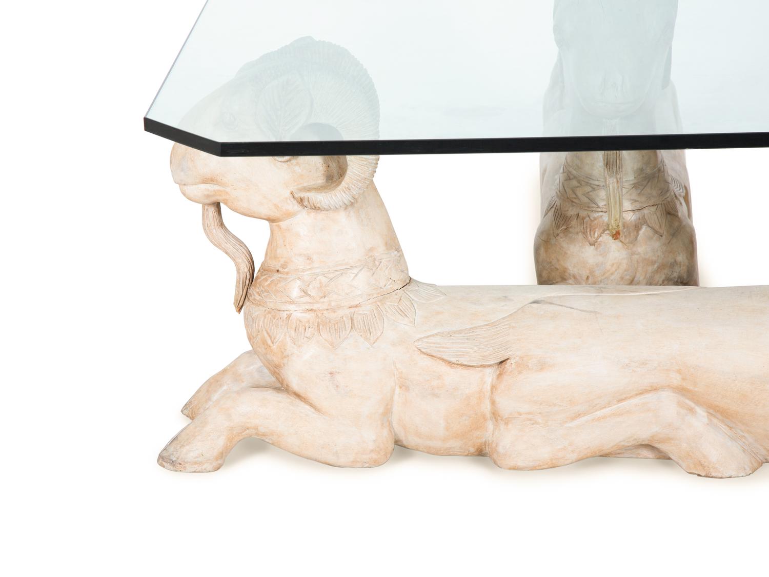 A Carved Wood and Glass Figural Low Table