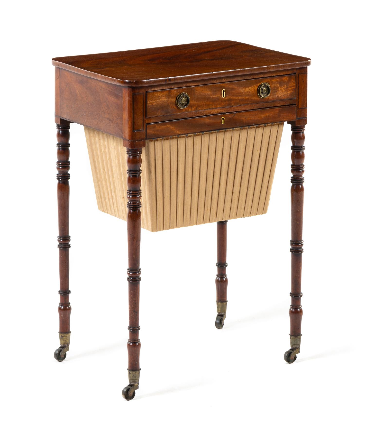 A Sheraton Mahogany Sewing Table Height 28 5/8 x width 20 1/2 x depth 14 3/4 inches. — FIRST HALF 19TH CENTURY