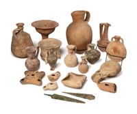A Group of 19 Holy Land Terracotta Oil Lamps, Pottery, and Bronze Blades