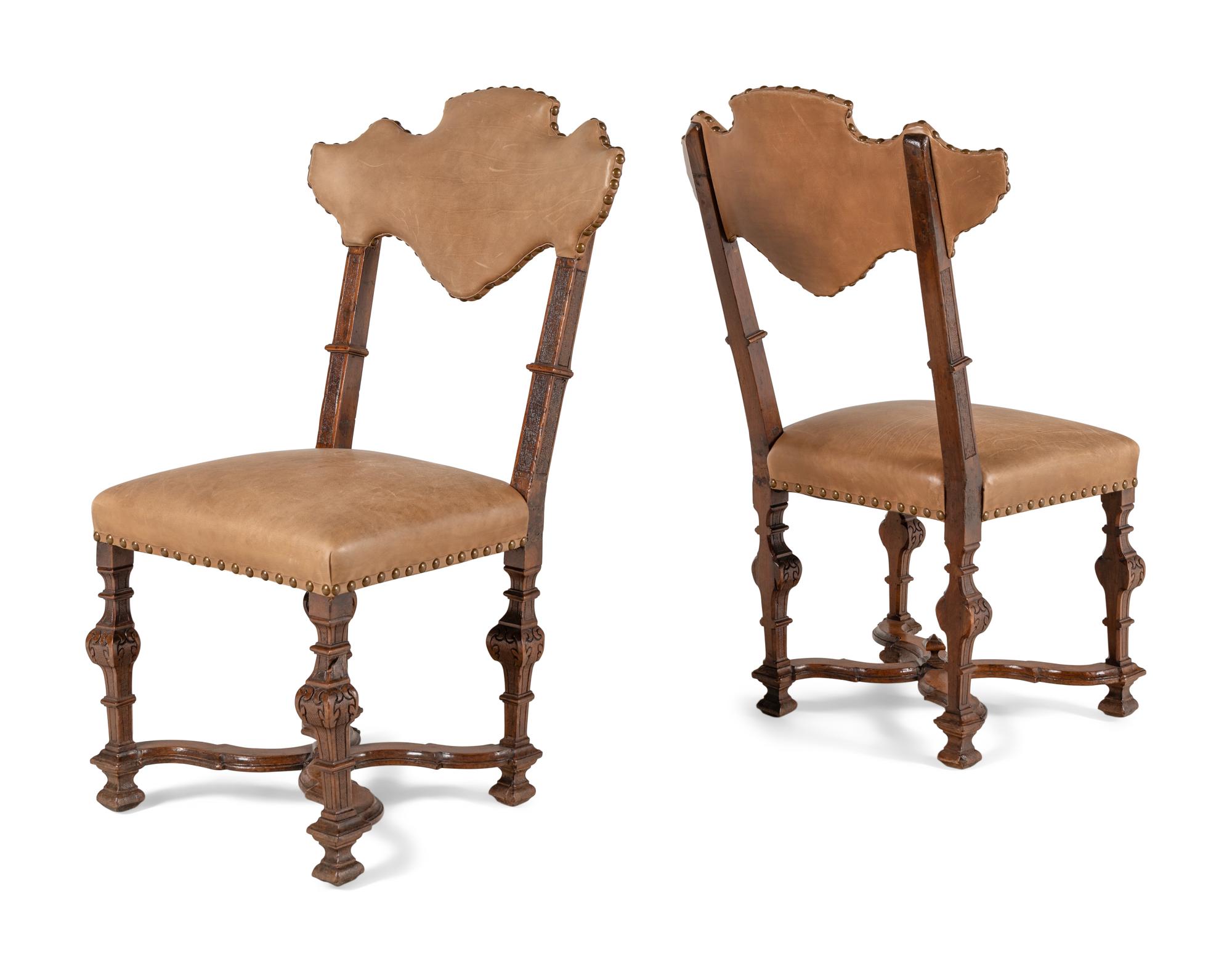 A Set of Twelve Spanish Baroque Style Dining Chairs