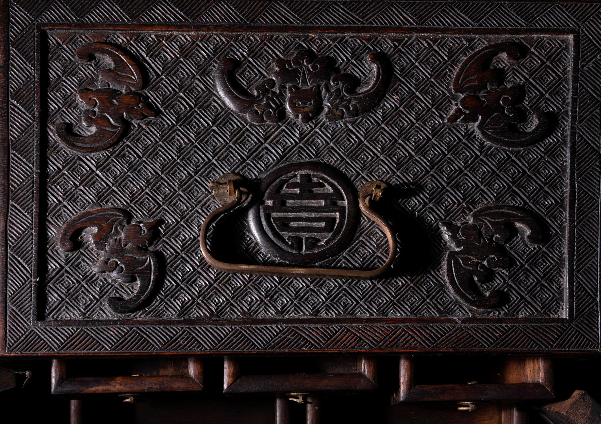 A Chinese Carved Rosewood Chest