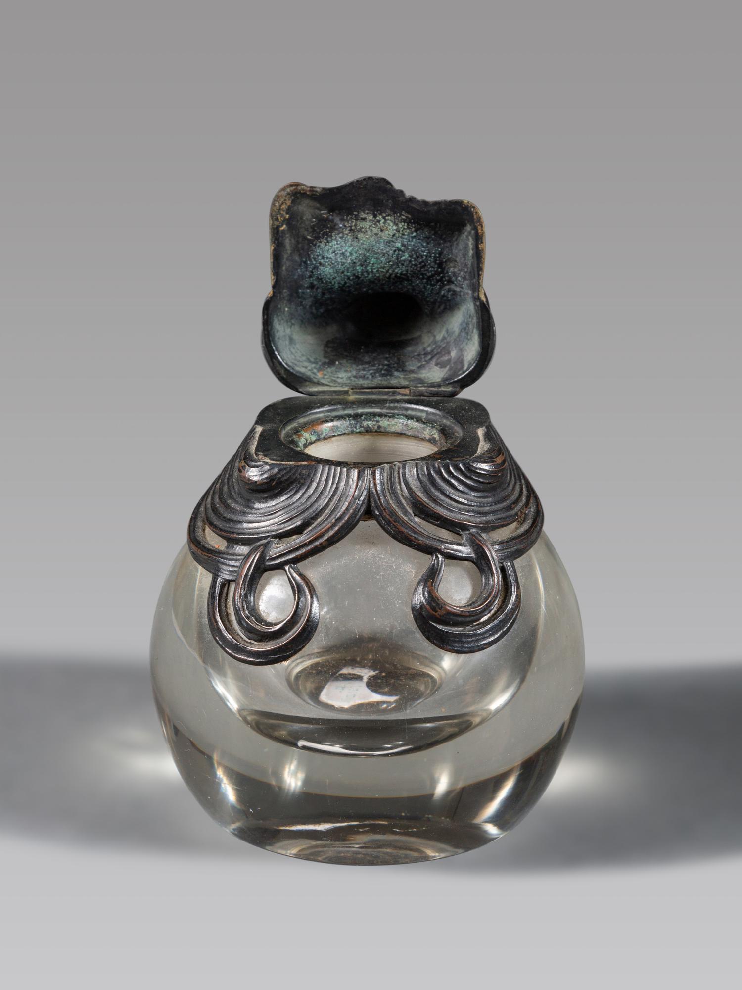 An Art Nouveau Bronze Mounted Glass Inkwell and Wall Mirror