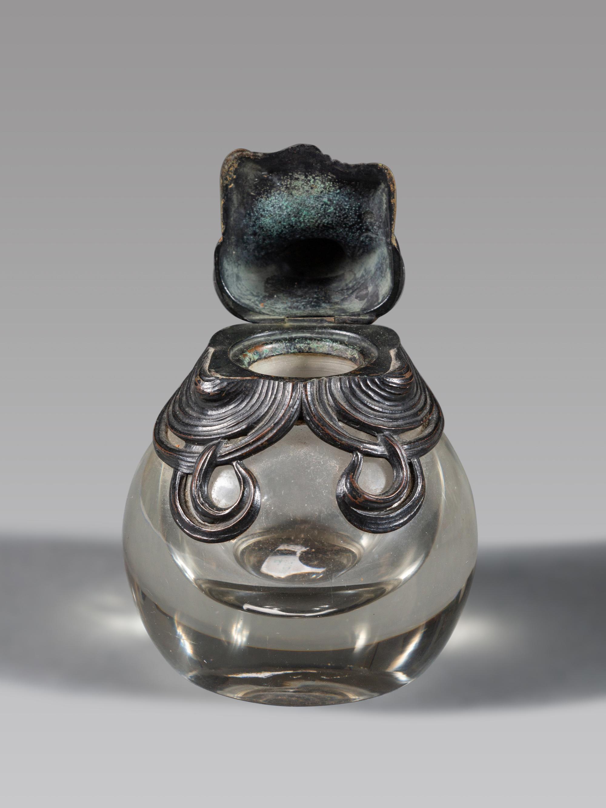 An Art Nouveau Bronze Mounted Glass Inkwell and Wall Mirror
