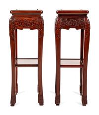 A Pair of Chinese Carved Hardwood Pedestals