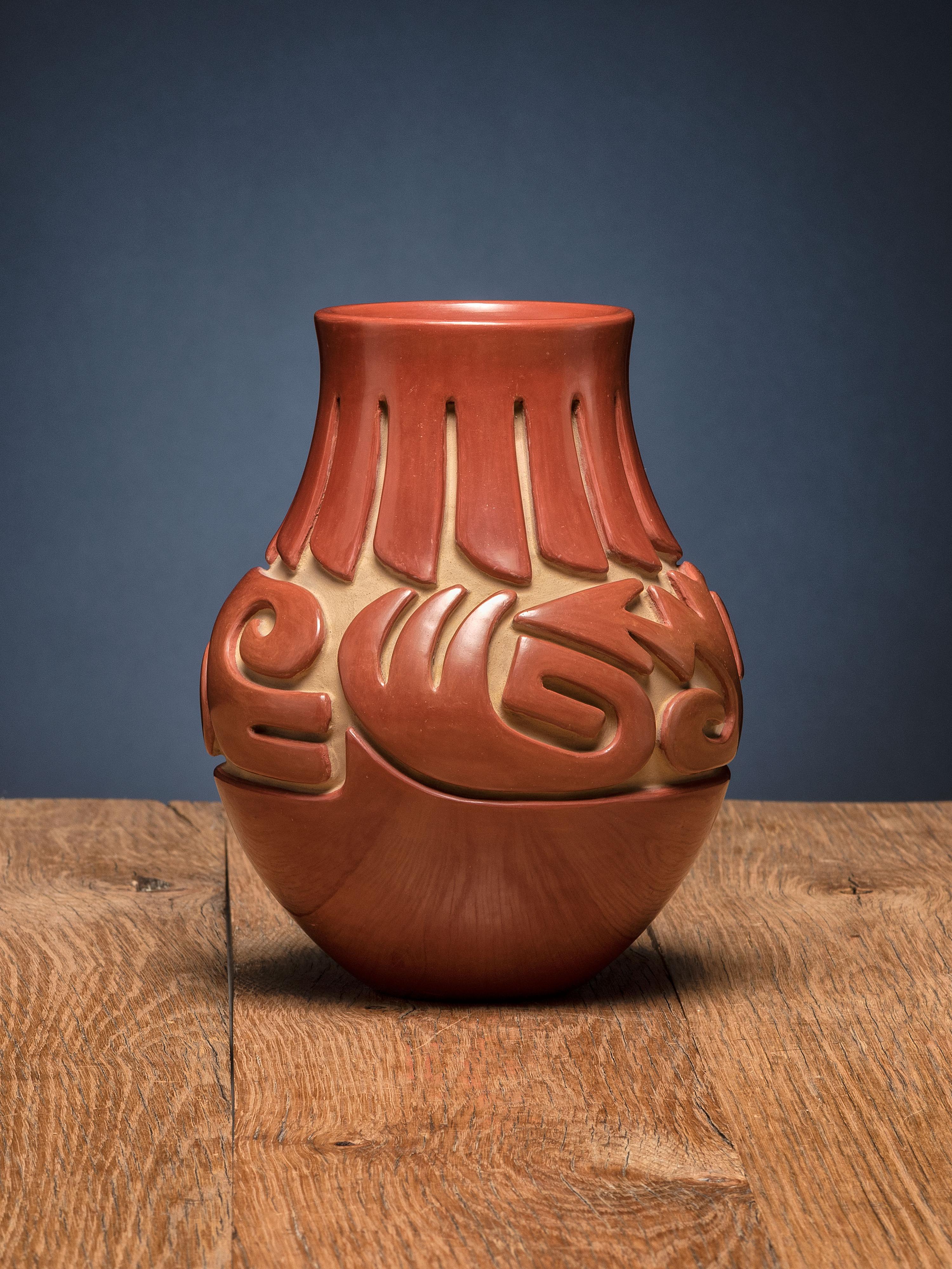 Carved Redware Jar