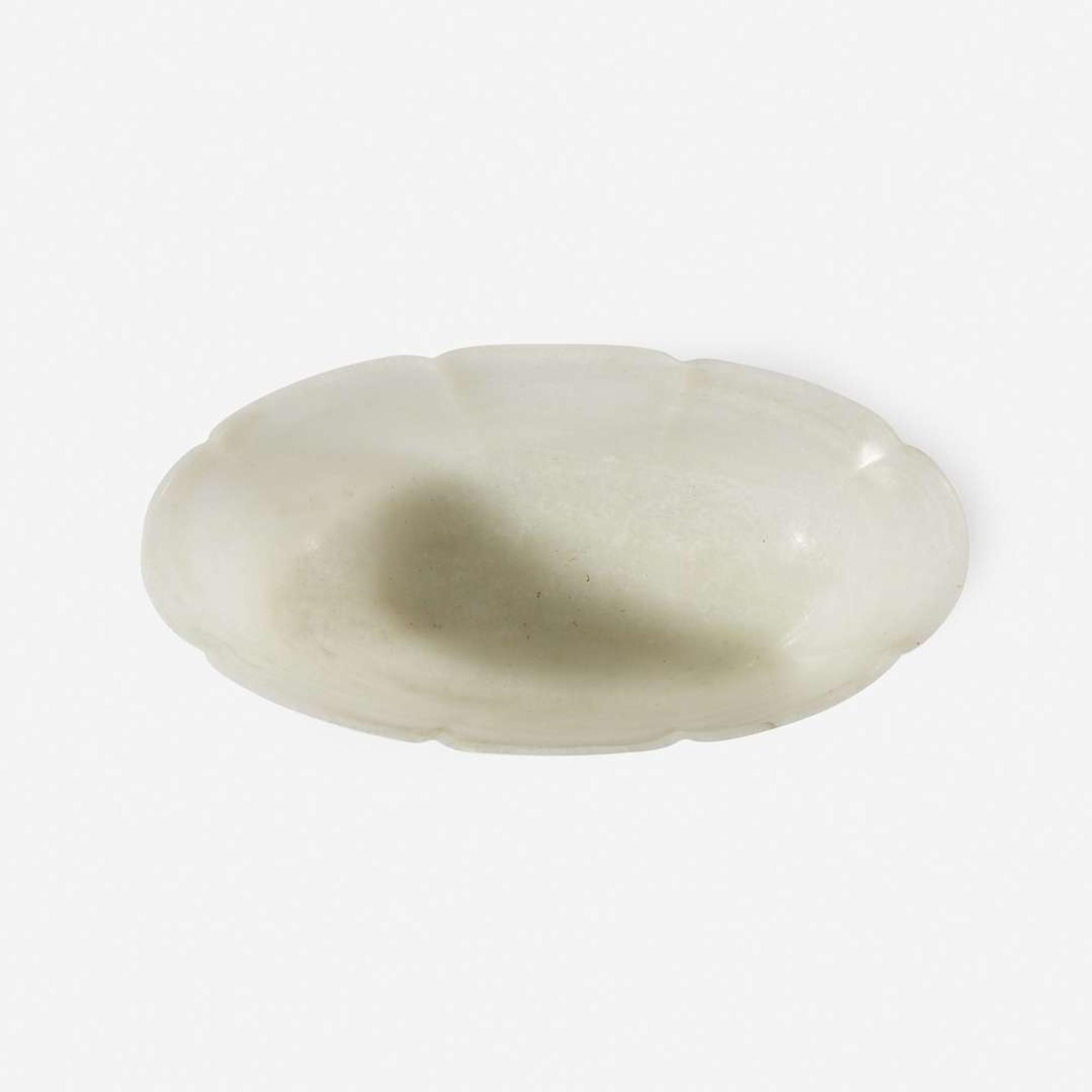 A Chinese pale greyish-white jade lobed oval bowl 灰白玉莲瓣碗