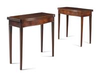 A Pair of George III Mahogany Games Tables