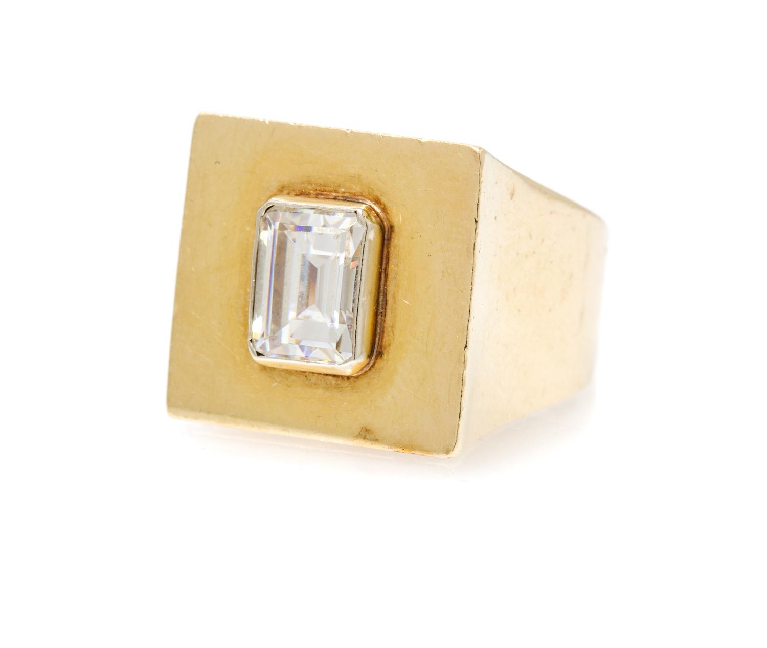 A 14 Karat Yellow Gold and Cubic Zirconia Ring, 7.80 dwts.
