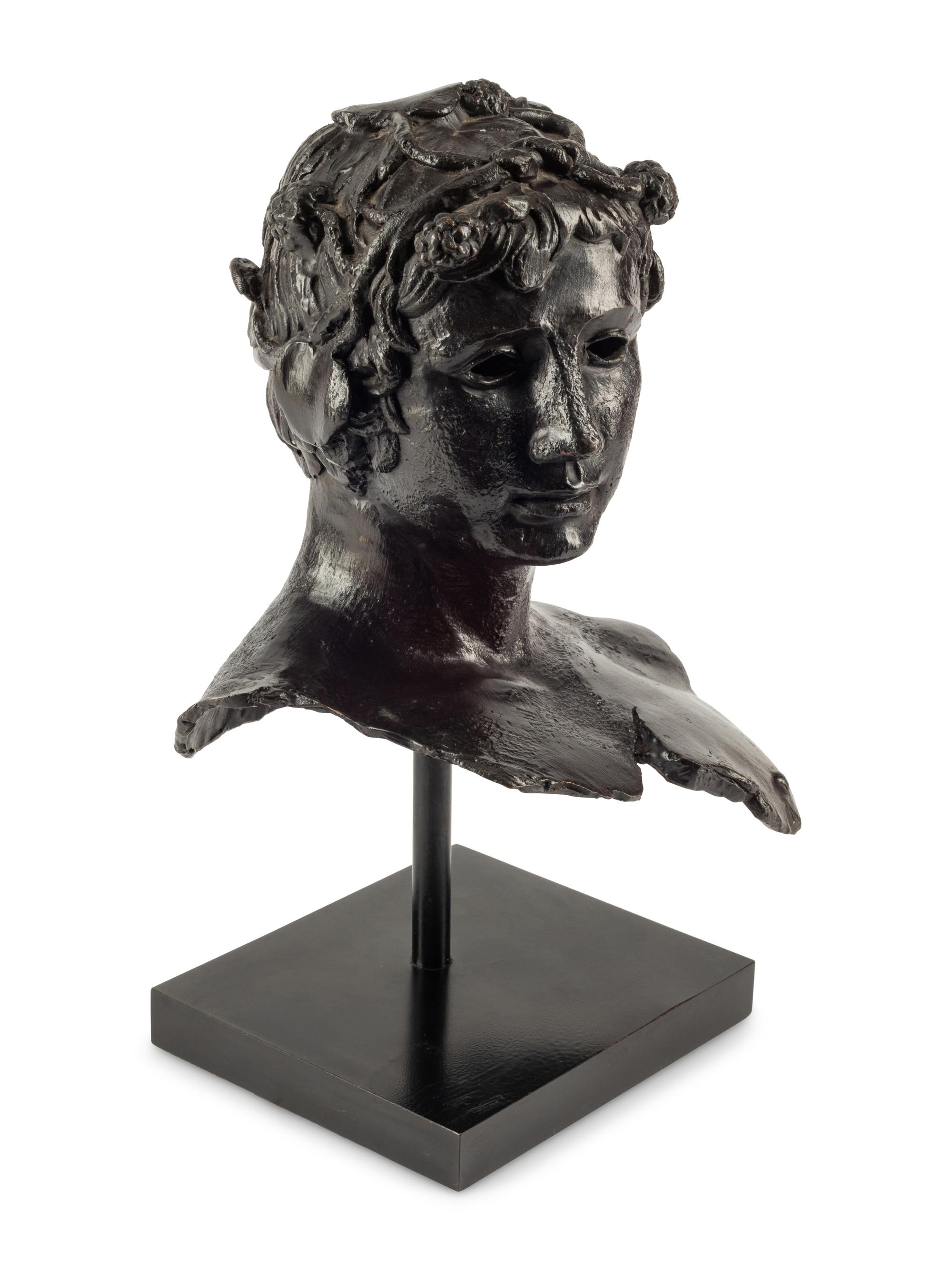 A Continental Bronze Head of Bacchus